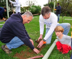 Hillendale Elementary School Principal Stewve Dissinger, left, and Ken Batchelor, assistant to the superintendent of the Unionville-Chadds Ford School District, lend a hand.