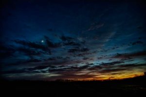 Read more about the article Photo of the Week: Moon Over Sunset