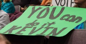 Another sign urges Kevin O'Donoghue to reject the plan. O'Donoghue did just that.