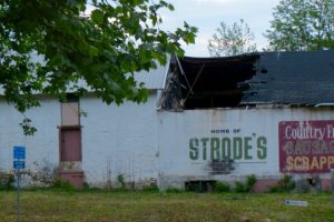 To the left of the collapsing roof, an addition for the scrapple operation, is a historic English-style barn that will be saved. The addition is expected to be razed to uncover the historic foundation.
