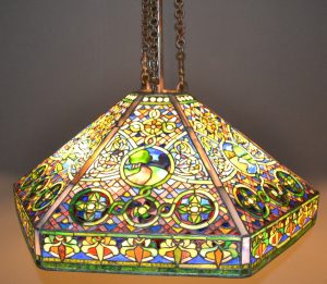 Landscape is a leaded glass and bronze hanging shade from 1905 that is included in the Winterthur exhibit.