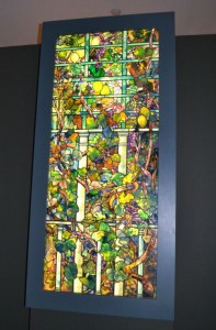 'Grape Vine and Lemon Tree with Trellis' greets visitors as they enter the 'TiffanyGlass: Painting with Color and Light' exhibit at the Winterthur Museum.