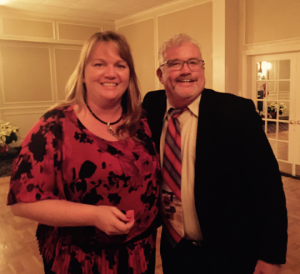 Anne Eunson with the winning ticket is congratulated by Ron Hudecheck, BPA President
