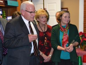 Oxford Police Chief John Slaugh (from left), a CVC board member; Peggy Gusz, CVC's executive director; and Sharon Rose, co-recipient of the 2015 John J. Crane award, listen as Jose Reyes, CVC's board president, describes the honor.