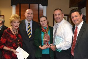 CVC Executive Director Peggy Gusz (from left), District Attorney Tom Hogan, John J. Crane recipients Sharon Rose and David Maurer, and CVC Board President Jose Reyes celebrate victim advocacy.