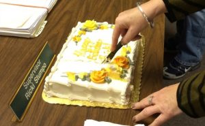 A celebration followed Monday night's supervisors' meeting as Supervisor Elaine DiMonte cuts a birthday cake for Supervisors' Chairman Ricki Stumpo,