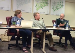 Kennett Township Supervisors Whitney Hoffman (from left) and Richard L. Leff listen as Scudder G. Stevens reads a proclamation from the state Senate applauding the township for its greenway efforts.