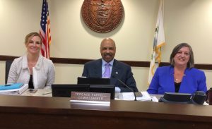 Chester County Commissioners Michelle Kichline (from left), Terence Farrell, and Kathi Cozzone say they used iPads for the first time instead of paper to review their agenda.