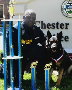 Chester County Deputy Sheriff Paul Bryant and Don, his K-9 partner, savor a big win at the