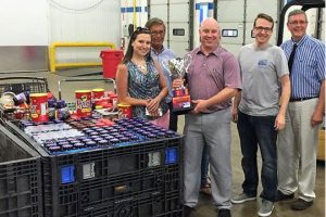 Amanda Thomas, Steve Turner, and Matt Gorham from the Matt Gorham Group of Keller Williams Realty; Toren Peterson, Business Relationships Manager for United Way of Chester County; and Larry Welsch, Executive Director of the Chester County Food Bank.