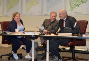 Kennett Township Supervisors Whitney S. Hoffman (from left), Richard L. Leff, and Scudder G. Stevens react to the camera at their meeting on Wednesday, July 6.