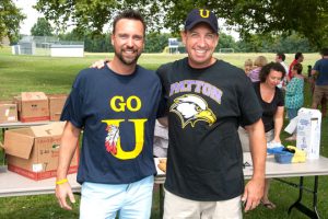 School Principals Tim Hoffman of Patton Middle School, right, and Jimmy Conly UHS principal, show their joint spirit by wearing each other's spirit shirts.