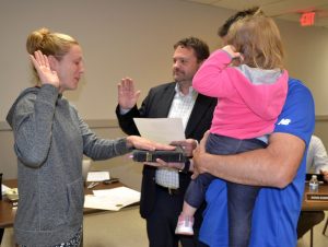 Stephanie Everett (left) is sworn in as a member of the Civil Service Commission by Mayor Matt Fetick.