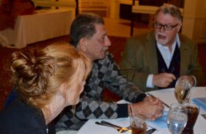 Joined by his daughter Penny DiOttavio, longtime Kennett Square resident Tony DiOttavio (center), who went to grade school with the former police chief, chats with former magisterial district judge Daniel Maisano.