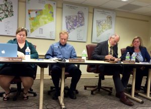 Kennett Township Supervisors Whitney S. Hoffman (from left), Richard L. Leff and Scudder G. Stevens are shown with Township Manager Lisa M. Moore prior to the start of Wednesday night's meeting.